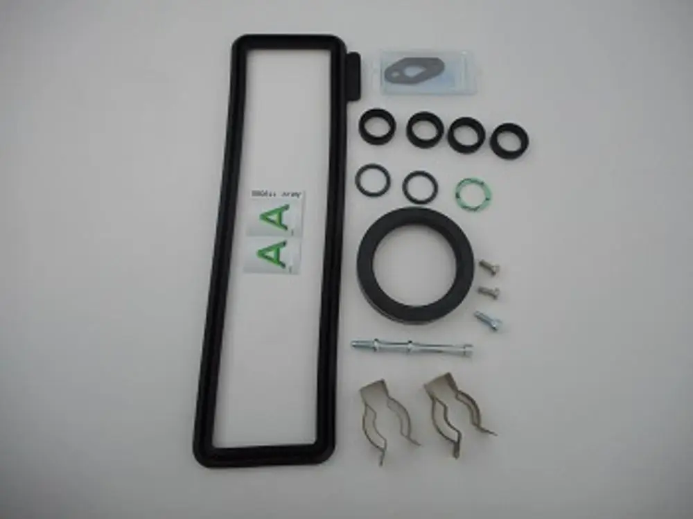 Remeha Montagekit mit Dichtungen, Schrauben und Clips, geeignet für Heizsysteme, inklusive einer Dichtung und verschiedenen O-Ringen.